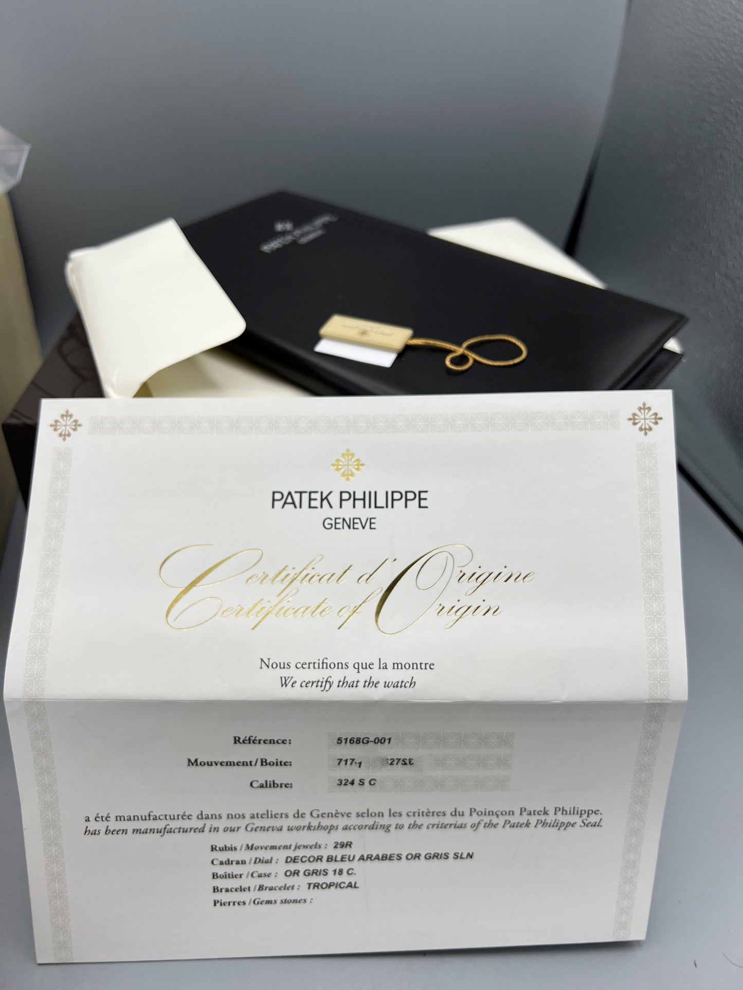 Patek Philippe Ref 5168G, Aquanaut Anniversary Model, Rare Unused full set, papers dated 2018