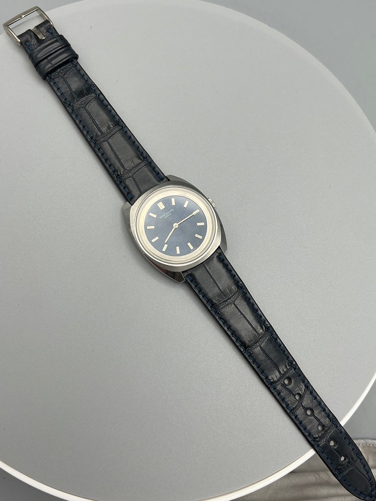Patek Philippe Ref 3579-1A, stainless steel cushion shaped, starburst blue dial, 1974 Mint