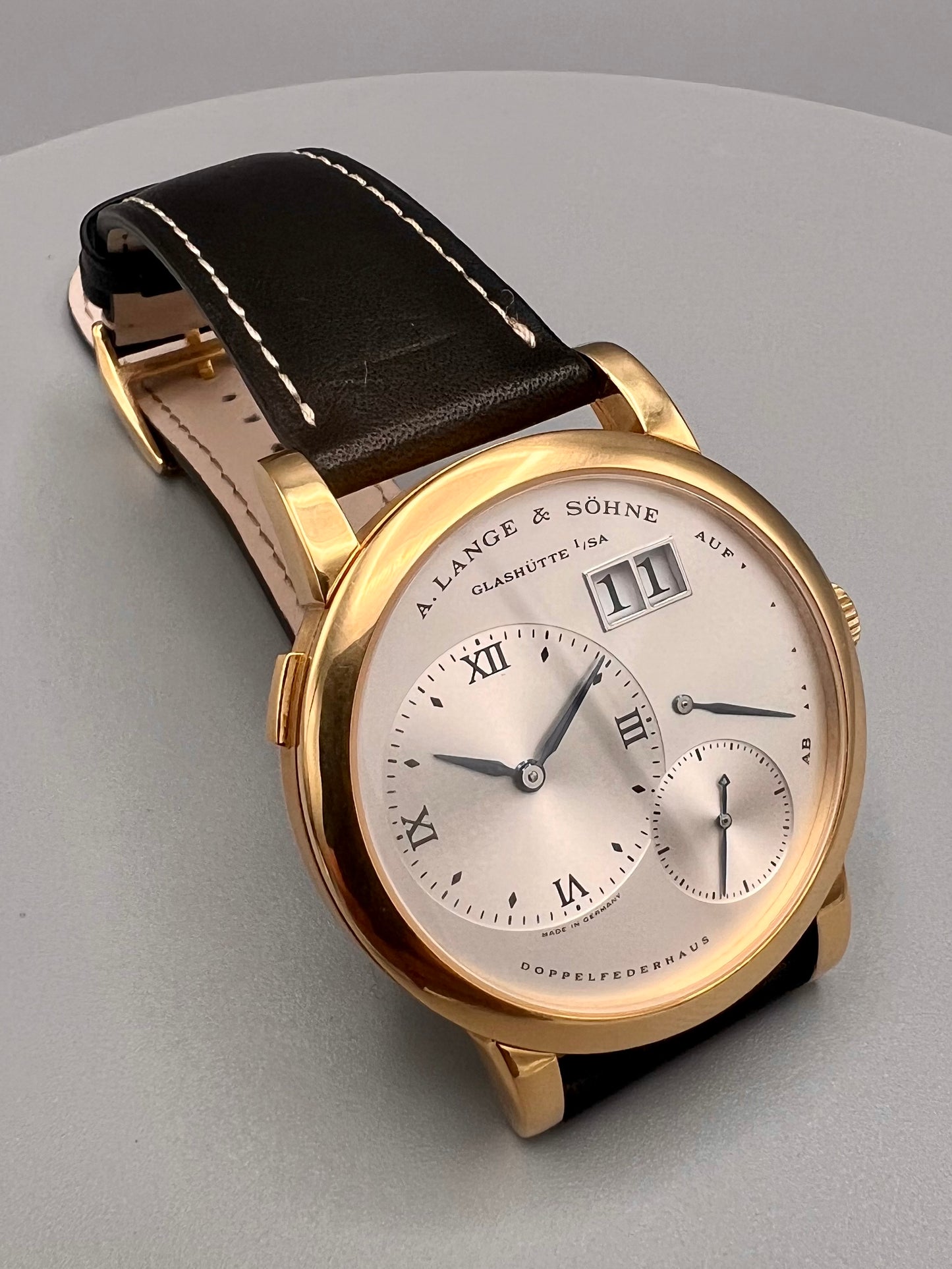 A Lange and Sohne Lange 1 101.022 18K Yellow Gold Blue Hands Silver Dial, Early 2000s