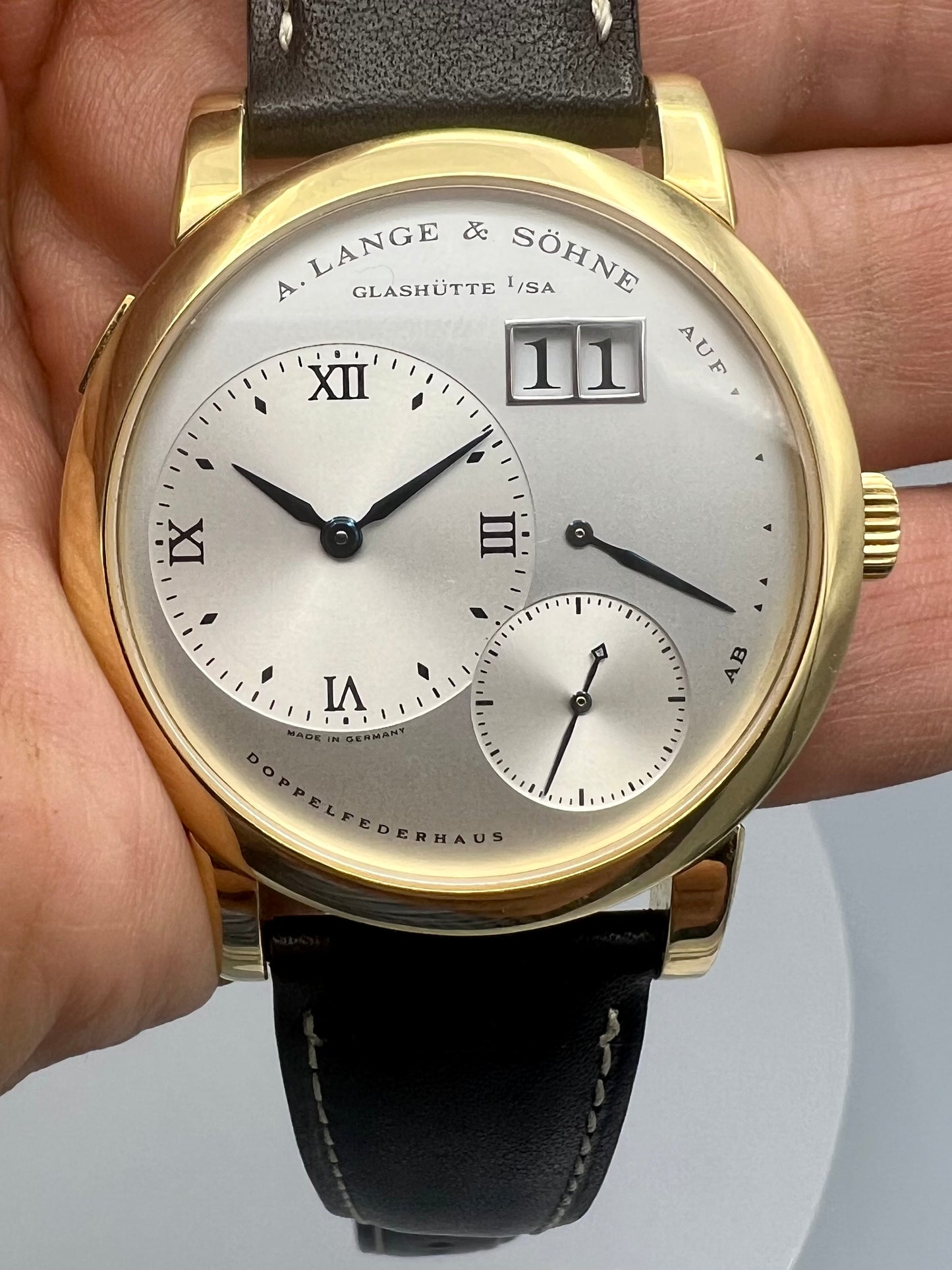 A Lange and Sohne Lange 1 101.022 18K Yellow Gold Blue Hands Silver Dial, Early 2000s