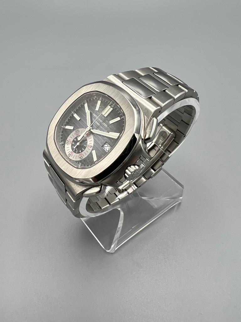 Patek Philippe Ref 5980/1A-001 Nautilus, Single Owner Watch, Full Set, Rare & Mint