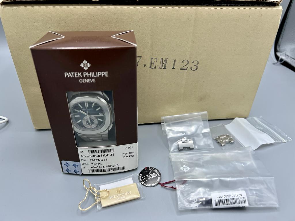 Patek Philippe Ref 5980/1A-001 Nautilus, Single Owner Watch, Full Set, Rare & Mint